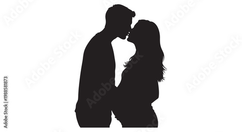 Silhouetted couple embracing in a romantic tender moment of affection