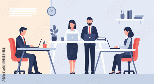 Modern office scene with four professionals working on laptops at desks