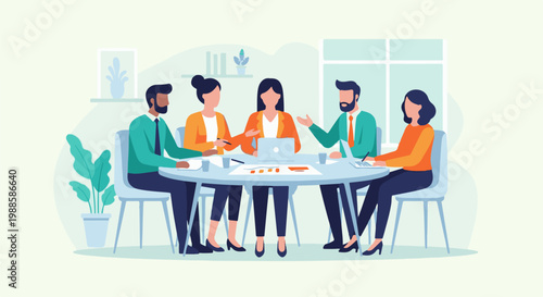 Diverse team collaborates around a table in a modern office meeting