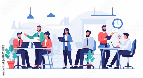 Colleagues collaborating and working on laptops in a modern office environment