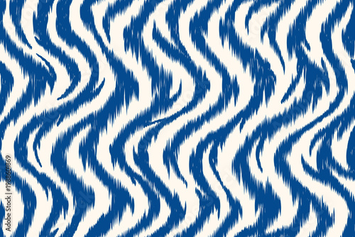 Seamless ikat pattern with hand drawn zigzag wave texture in indigo blue and cream background, abstract ethnic textile surface design.