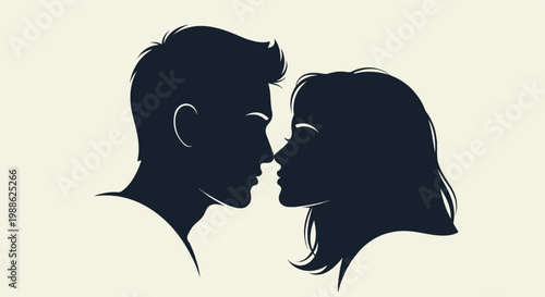 Silhouette of a couple leaning in for a kiss