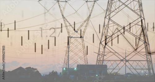 Towering pylons spanning lines across sunset by suburb edge, with substation lights and overlay