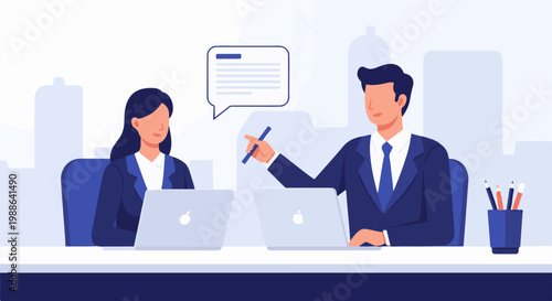 Two professionals in business attire work together at desks with laptops and a speech bubble