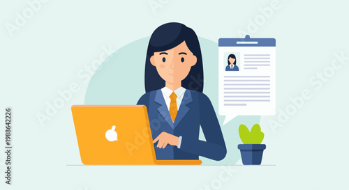 Businesswoman working on laptop with resume displayed nearby