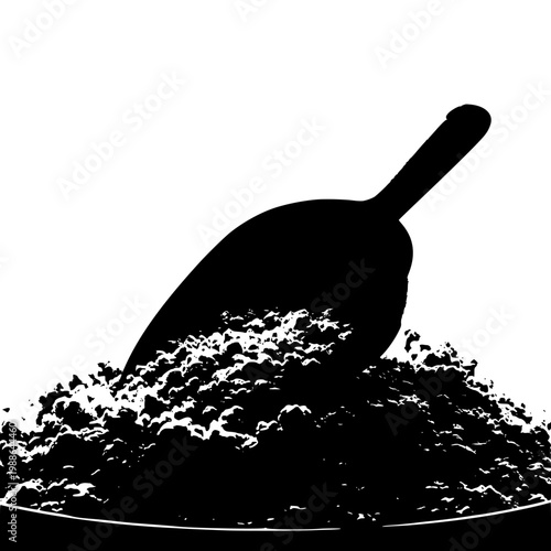 A black sanding scoop placed atop a pile of green and brown sanding compound granules