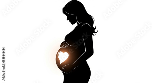 A pregnant woman's silhouette with a glowing heart on her belly