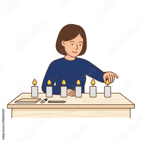Woman lighting candles on a wooden table