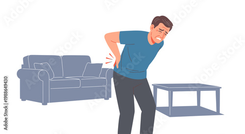 Man experiencing lower back pain while standing at home
