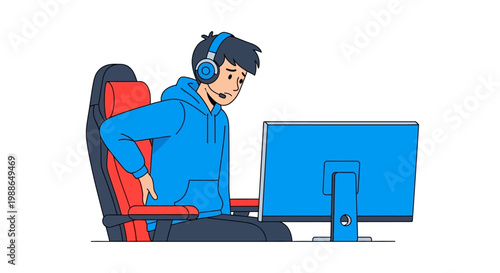 Young man holding his lower back in discomfort while sitting at gaming desk