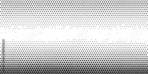 A halftone pattern of diminishing dots creating a gradient effect