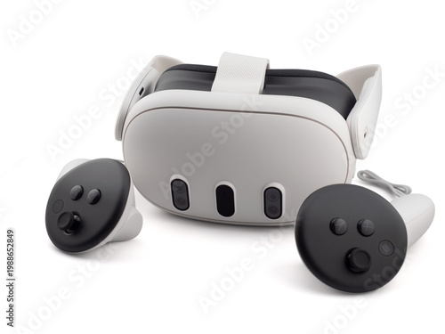 Virtual reality headset with wireless controllers on white background