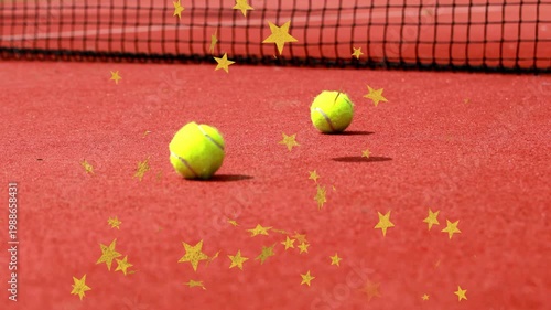 Tennis ball appearing and bouncing others entering forming group on court by net stars swirling