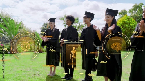 Graduates on lawn hearing off-frame prompt, turning, clapping with gold AR HUD skeleton brain