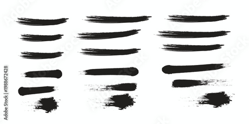 Collection of rough black brush strokes and paint splatter textures