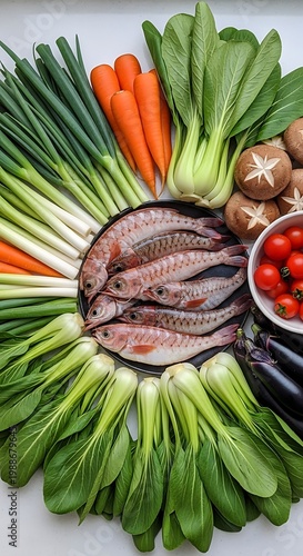 Array of fresh fish, vegetables, and mushrooms arranged artistically