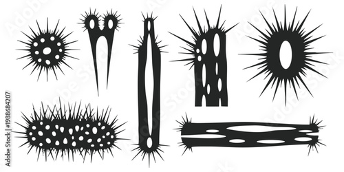 Set of abstract spiky virus cell shapes vector illustration in black