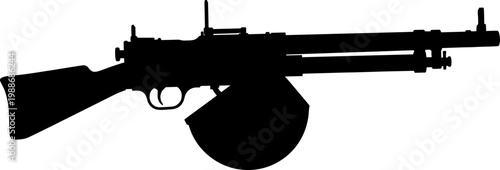 Antique machine gun silhouette featuring circular drum magazine