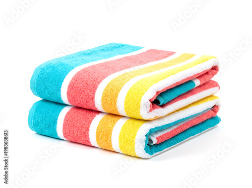 Stack of colorful towels with yellow, pink, and blue stripes isolated on white background