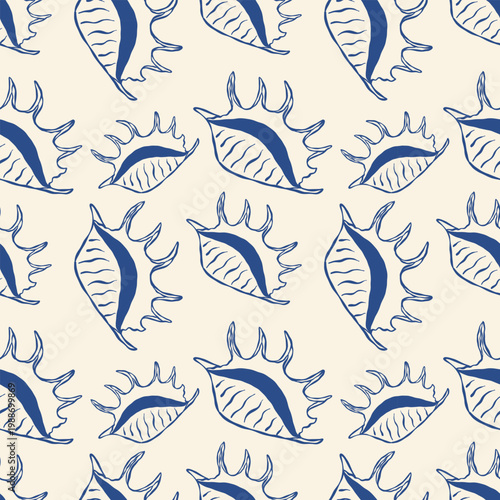 Blue seashell patterns float across a creamy background