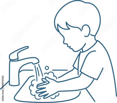 A child washing their hands in a sink