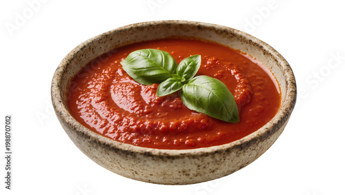 Foto Rustic bowl filled with vibrant tomato sauce garnished with fresh basil leaves,