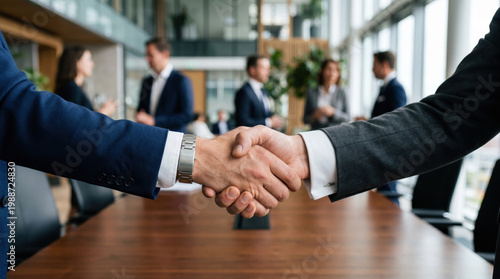Close-up of Business Handshake After Successful Meeting in Office
