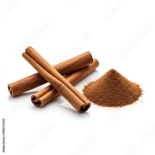 Aromatic whole cinnamon sticks arranged next to a pile of ground cinnamon spice isolated on a white background for culinary use