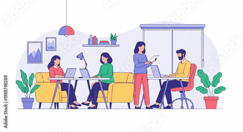 Four people working together in a bright, modern office space