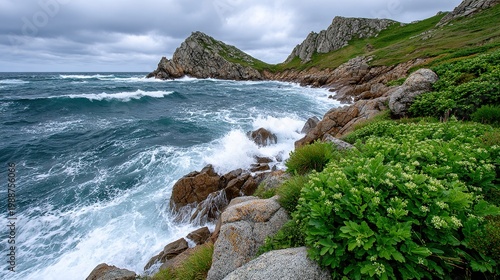 Stormy sea with large waves crashing against a rocky coastline under an overcast sky.