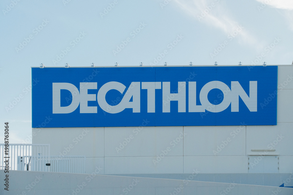Fototapeta premium Finestrat, Spain - March 19, 2026: Decathlon logo on signboard on store facade outdoors