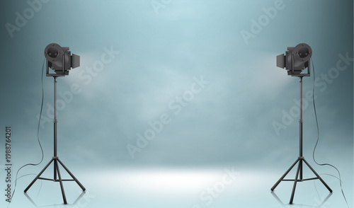 Professional studio spotlights on tripods with mist