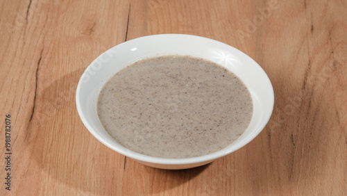 Mushroom cream soup bowl isolated
