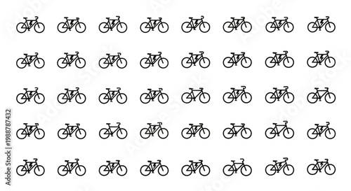 Many bicycles in a row cycling.