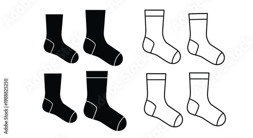Foto Four pairs of socks displayed in black and white a stark silhouette