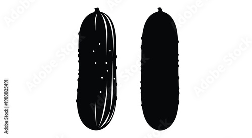 Two cucumbers displayed side by side in a stark black silhouette