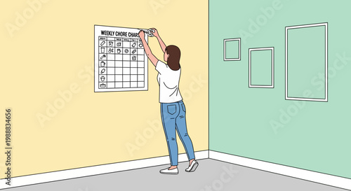 Woman hangs weekly chore chart on wall, organizing household tasks and responsibilities