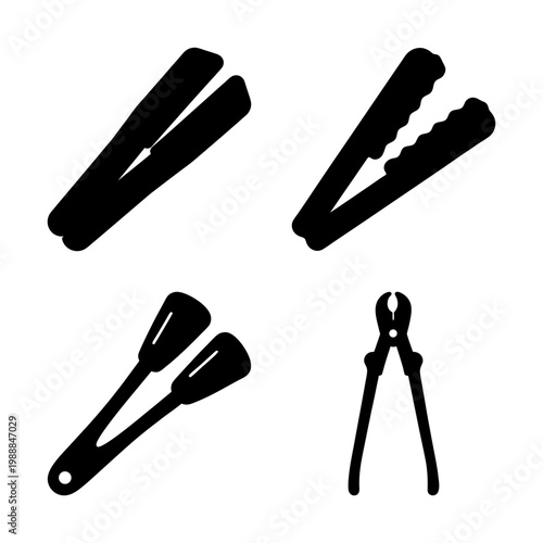 Four different styles of metal tongs and pincers isolated on white