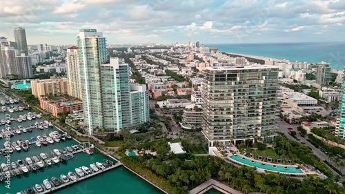 Luxury south beach marina. Miami skyscraper at south beach. Docked luxurious yacht boat. Luxurious life. Miami luxury marina. Summer vacation. Marina aerial view. Yacht sea harbor