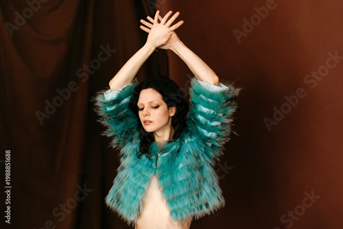 Womanin blue faux fur jacket