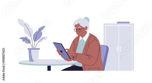 Elderly woman using a tablet computer at a table with a plant and cabinet