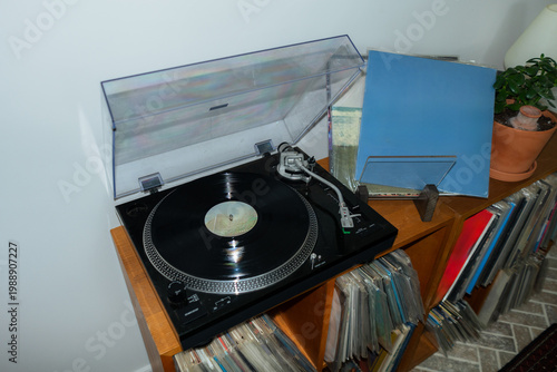Blue album near turntable (copyspace) 
