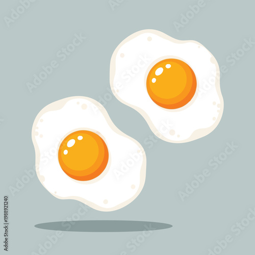 Two fried eggs with bright orange yolks sit on a pale blue background.