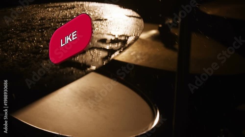 Cymbals vibrating from strike, ejecting droplets while social media badges sliding in for marketing
