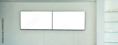 Fotografie Two blank white horizontal digital screens mounted on a minimalist wall