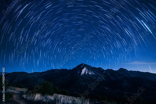 A starry night sky above a mountain range