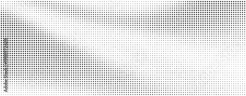 Halftone pattern with small black dots on a white background
