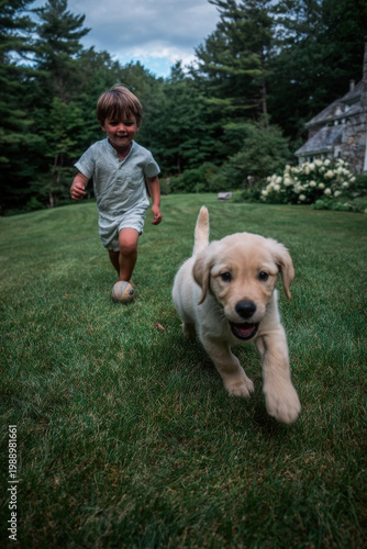 confident woman drying her hair with hairdryer against clean milky background