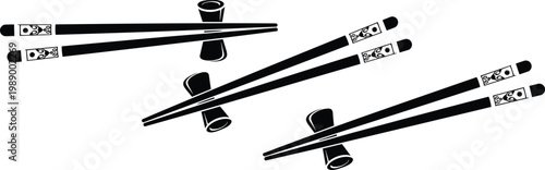 Black chopsticks on chopstick rests isolated on transparent background set.
