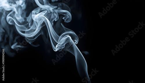A mesmerizing stream of smoke swirling in the darkness